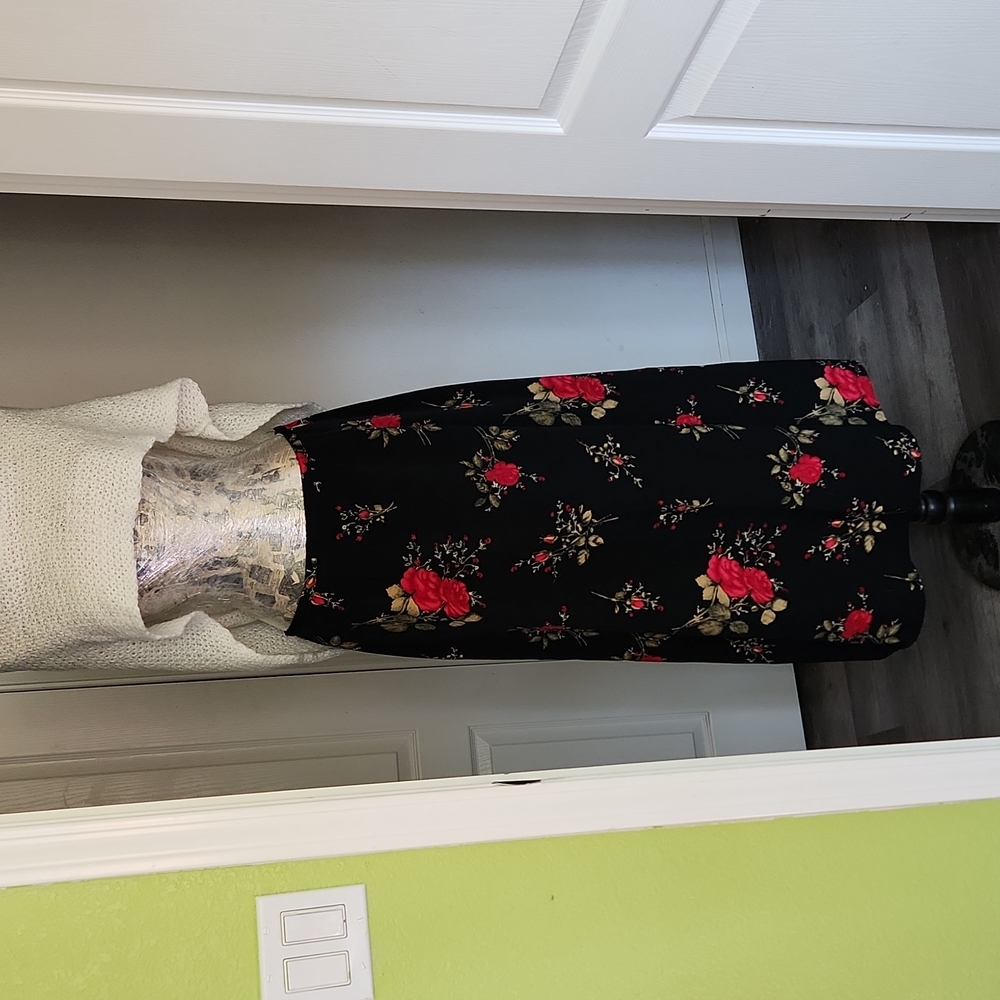 Rose on black skirt
